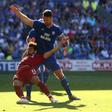 Liverpool's Egyptian forward Salah is fouled by Cardiff defender Morrison
