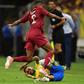 Brazil star Neymar tackles Qatar's Pedro Correira before leaving the field with an injury in a friendly on Wednesday