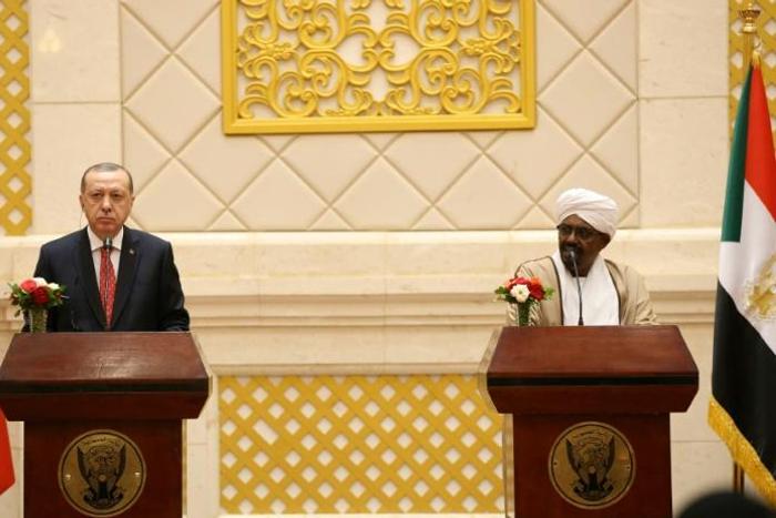 President of Turkey Recep Tayyip Erdogan (L) and President of Sudan Omar al-Bashir address a press conference in Khartoum in December 2017 -- Erdogan's visit was the first by a Turkish president