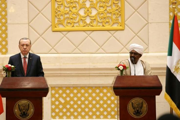 President of Turkey Recep Tayyip Erdogan (L) and President of Sudan Omar al-Bashir address a press conference in Khartoum in December 2017 -- Erdogan's visit was the first by a Turkish president