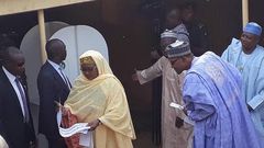 Nigeria's Buhari checks wife's ballot to see who she voted for