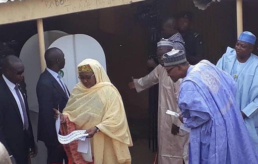 Nigeria's Buhari checks wife's ballot to see who she voted for