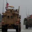US military vehicles on patrol in Syria's northern city of Manbij on December 30, 2018