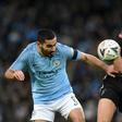 Manchester City midfielder Ilkay Gundogan (L), in action against Burnley last month, has won titles under both Jurgen Klopp and Pep Guardiola