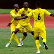 Kaizer Chiefs highly paid star Khama Billiat (C) celebrates a goal with Zimbabwe team-mates