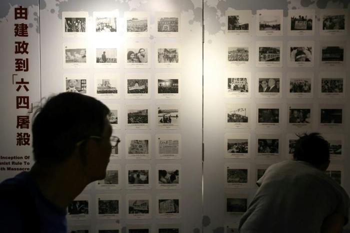 Photographs related to the 1989 Tiananmen Square crackdown are displayed at the June 4 Museum in Hong Kong during its opening on April 26, 2019. On the mainland, the protests have largely been whitewashed from history