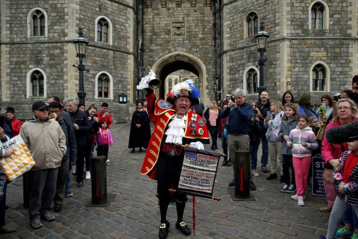 News of the royal birth may have been posted on Instagram, but town crier Tony Appleton declared the event in more traditional fashion outside Windsor Castle