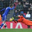Tottenham captain Hugo Lloris saves Jamie Vardy's penalty at Wembley