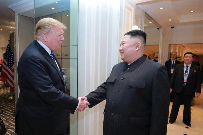 North Korean leader Kim Jong Un and US President Donald Trump shake hands in Hanoi, where their summit was seen as a disappointment