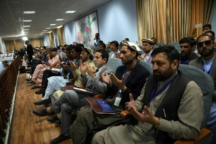 Afghan men pray at this week's 'loya jirga', or grand assembly, which saw about 3,200 politicians and religious and tribal leaders gather in Kabul