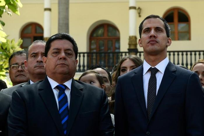 Edgar Zambrano, pictured (left) with opposition leader Juan Guaido, has been transferred to Caracas' largest military complex, Fort Tiuna