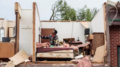 In the Midwest, heavy rains, devastating floods and 'Then the Sirens Go'