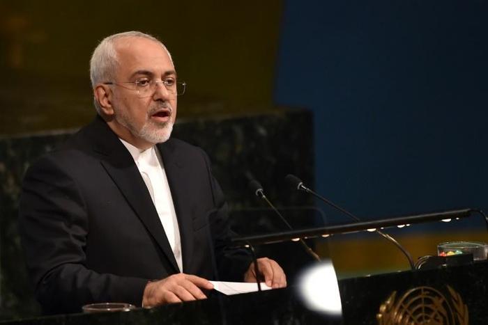 (FILES) In this file photo taken on April 24, 2018, Iranian Foreign Affairs Minister Mohammad Javad Zarif speaks during the 72nd High-level Meeting on Peacebuilding and Sustaining Peace at United Nations Headquarters in New York. The US decision to end...