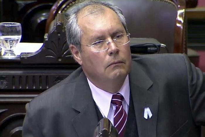 Argentine lawmaker Hector Olivares was shot while out walking with his chidlhood friend Marcelo Yadon, who was killed