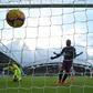 French striker Alexandre Lacazette scored as Arsenal beat bottom side Huddersfield Town to maintain their hopes of securing a Champions League spot