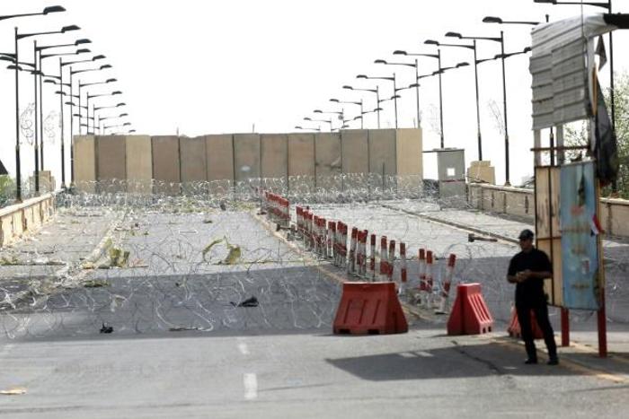 Iraqi riot police stand guard at the Jumhuriyah Bridge, a route leading from Tahrir Square to the Green Zone, in this file picture taken on May 6, 2016