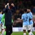 Pep pleasure: Manchester City manager applauds the travelling fans after a 1-0 win away to Bournemouth