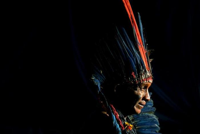 An indigenous man from the Arara tribe at a protest camp in Brasilia on April 25, 2019: some 4,000 indigenous people from different tribes are taking part in protests against encroachments by loggers, miners and farmers on their traditional lands