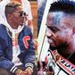 Shatta Wale fan tattoos Reign album symbol on his face