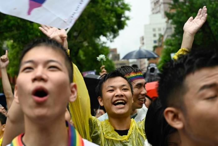 Gay marriage supporters cheered as it emerged lawmakers had approved much of their demands