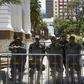 Bolivarian National Guard personnel stand guard outside the Venezuela's opposition-controlled National Assembly building in Caracas