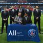 Shake on it: Paris Saint-Germain staff at the signing ceremony