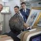Pope Francis, shown here accepting a gift from an Arab journalist aboard the papal plane, said the problem of sexual abuse by priests could be found "anywhere"