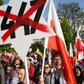 Far-right supporters who marched from the prime minister's office to the US embassy waved banners reading "No to claims", "Shame" and "Stop 477" 