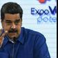 Venezuela's President Nicolas Maduro (left) is blocking US aid while self-proclaimed acting president Juan Guaido has vowed he will get the food and medicine into the country "one way or another"