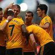 Ivan the great: Wolves midfielder Ivan Cavaleiro (2nd L) is mobbed by his team-mates after scoring the only goal of a 1-0 win away to Bristol City in the FA Cup fifth round