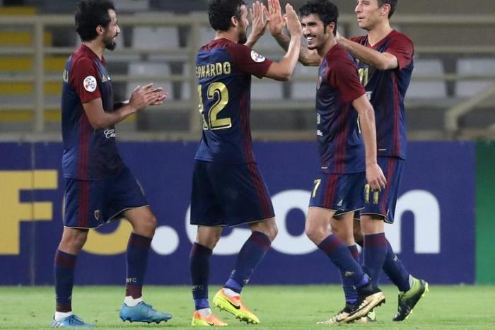 Wahda's midfielder Leonardo celebrates his goal against Uzbekistan's Lokomotiv