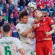 Bremen defender Milos Veljkovic (L) was sent off before Niklas Suele (R) sealed a late win for Bayern Munich on Saturday
