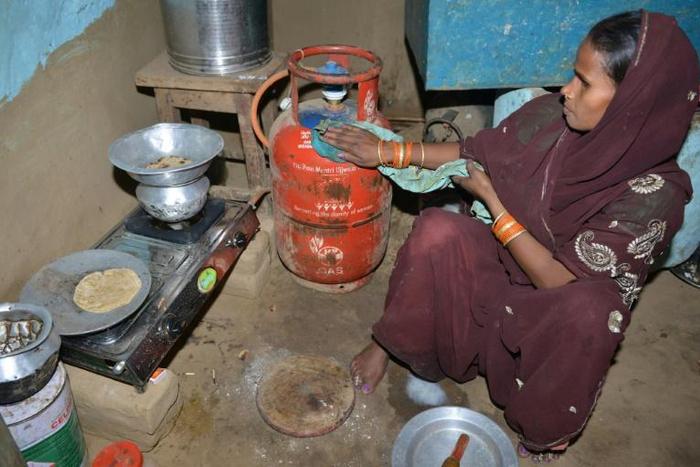 Reena Devi says she had to pay 3,000 rupees for the "free" gas cooking kit