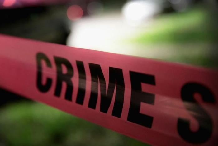 More than 1,000 guns have been seized in a raid on a mansion in an upscale neighborhood of Los Angeles