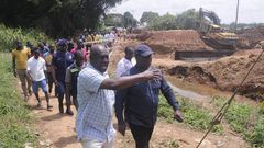 Minister for roads and highways inspects construction of damaged bridge at kwabeng