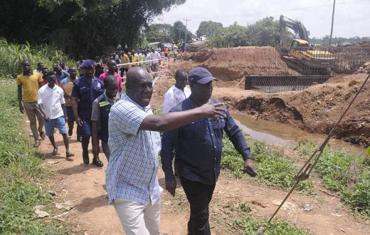 Minister for roads and highways inspects construction of damaged bridge at kwabeng
