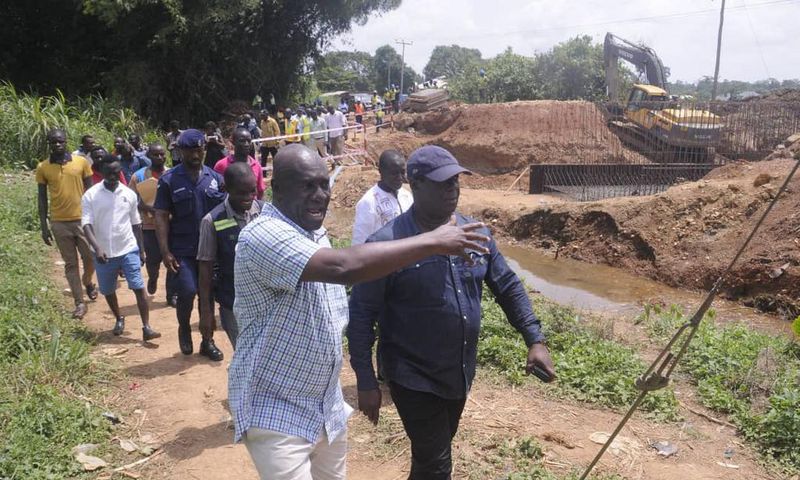 Minister for roads and highways inspects construction of damaged bridge at kwabeng
