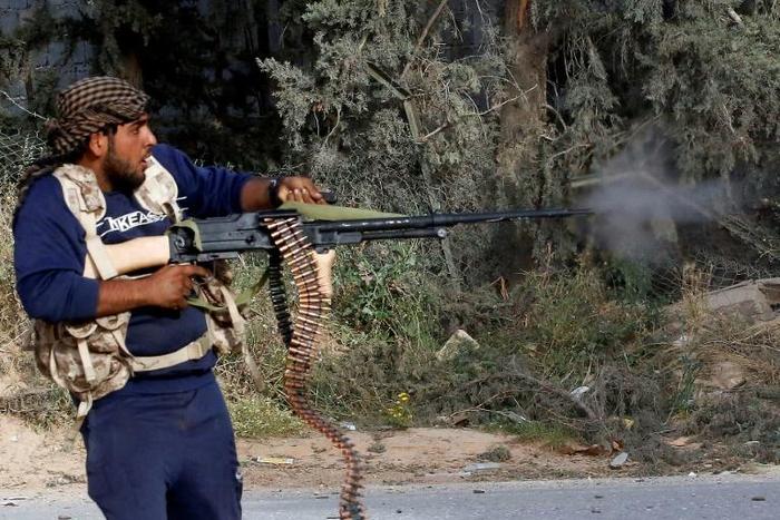 A Libyan fighter loyal to the Government of National Accord in clashes with forces loyal to strongman Khalifa Haftar south of the capital Tripoli
