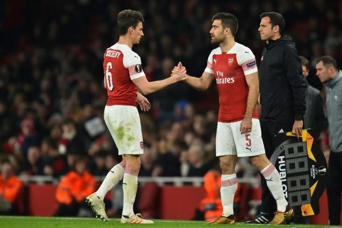 Arsenal defender Laurent Koscielny (left) is replaced by Sokratis against BATE Borisov