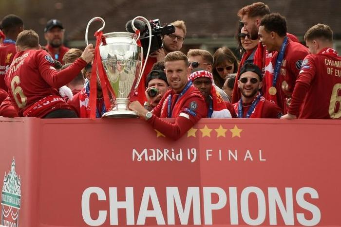 Liverpool captain Jordan Henderson kept a tight grip on the Champions League trophy