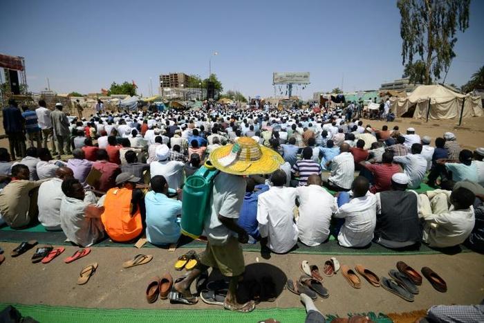 Sudanese protesters, attending Friday prayers near the military headquarters, have kept a sit-in at the site for weeks