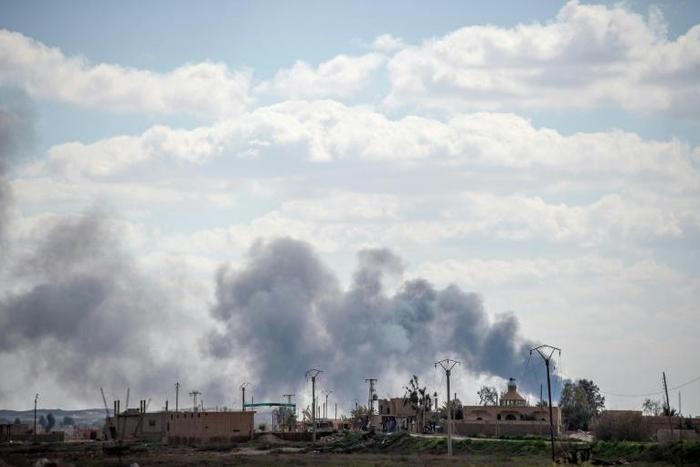 The Islamic State group's last sliver of territory in Syria is coming under heavy artillery fire and air strikes