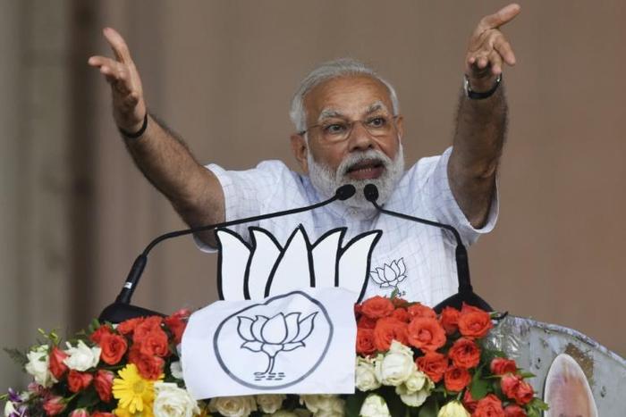 Indian Prime Minister Narendra Modi gestures during a campaign rally in Kolkata on Wednesday