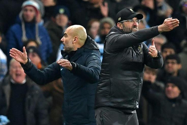 Liverpool manager Jurgen Klopp (right) and Manchester City boss Pep Guardiola are going head to head for the Premier League title