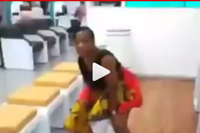 Woman urinates in the middle of banking hall to protest her locked up cash