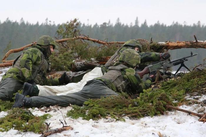 Young recruits based on the Baltic island of Gotland, seen here undergoing routine training, are at the forefront of Sweden's efforts to bolster its military as Stockholm worries about Russian intentions in Europe and the Baltic