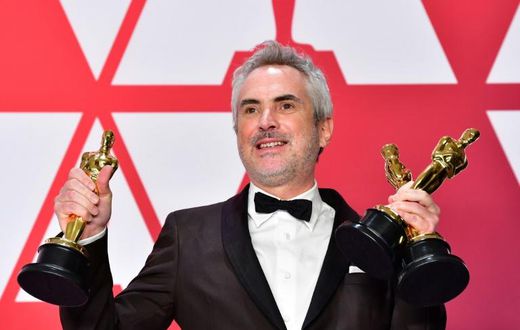 Mexican filmmaker Alfonso Cuaron is the pride of his homeland after winning three Oscars for "Roma," his ode to his childhood in Mexico City