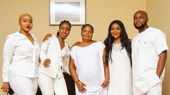 MzVee with her siblings and their mother