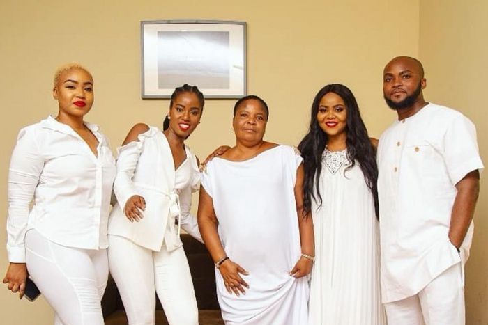 MzVee with her siblings and their mother