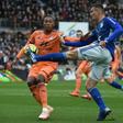 Painful end: Lyon's Brazilian defender Marcelo faces up to Strasbourg forward Ludovic Ajorque on Saturday
